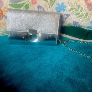 Small latched purse with chain